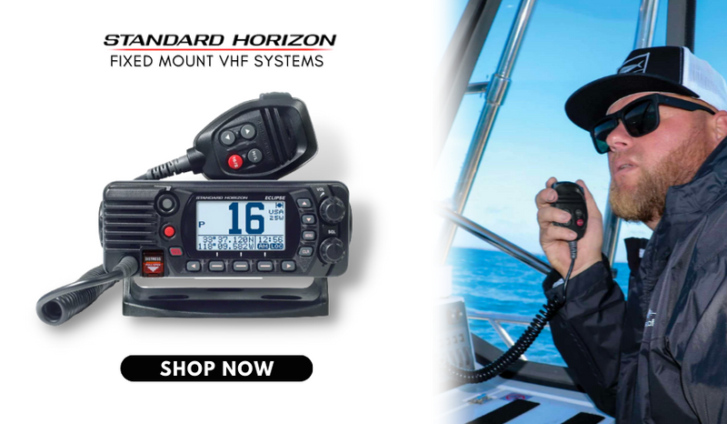 Man on boat holding Standard Horizon brand fixed mount VHF system